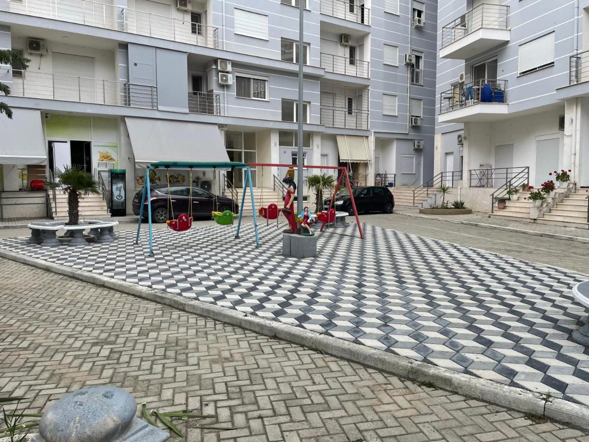 Shengjin Apartamento